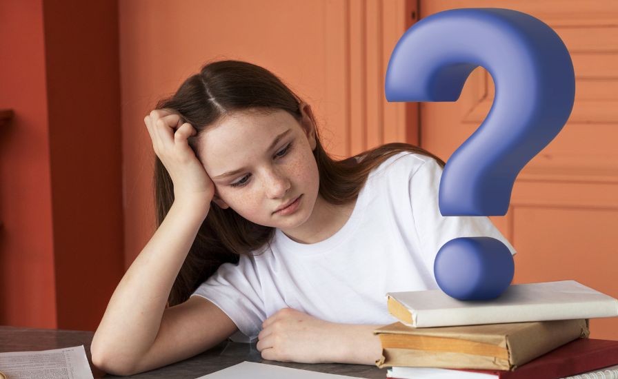 A girl sits at a table with books and a question mark, pondering what lies ahead after the exam